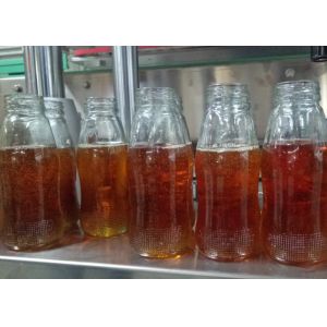 Professional Honey Volumetric Liquid Filling Machine Water Bottle Packing