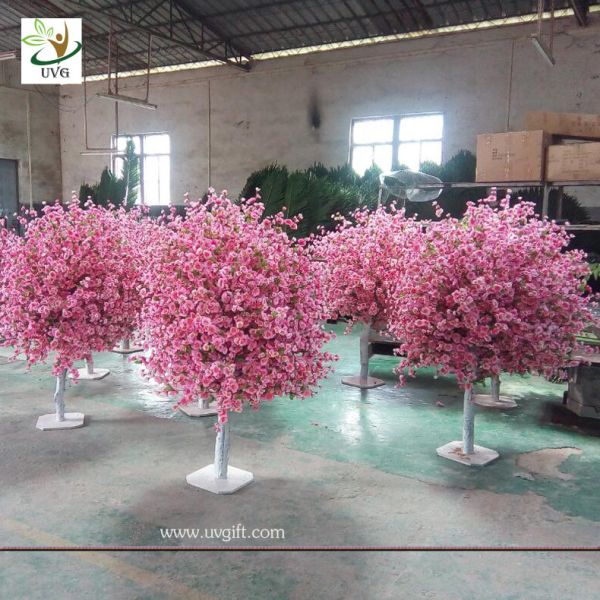 Buy UVG 5ft cheap artificial trees with fake peach blossoms for wedding table center pieces at wholesale prices