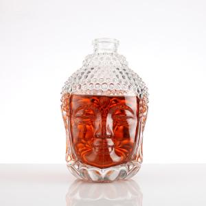 Aluminum Plastic PP Collar 750ml Clear Glass Spirits Bottle in Unique Buddha