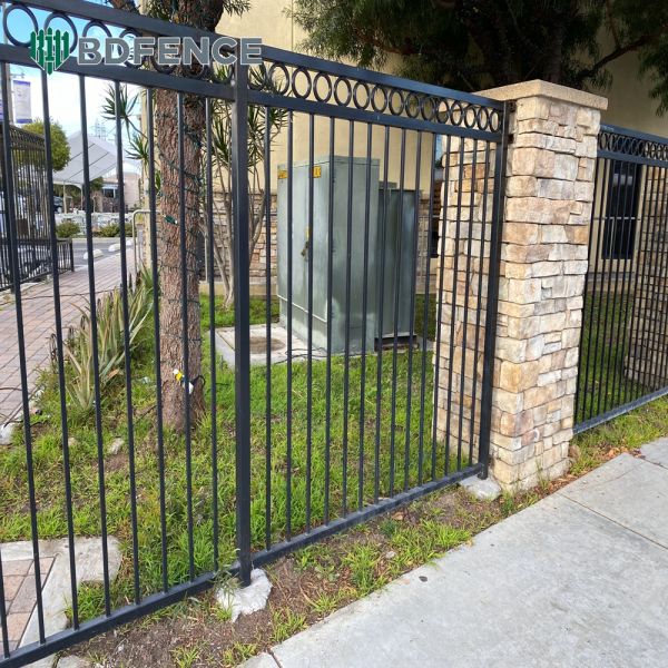 Sleek Tubular Steel Fence Enhances Curb Appeal