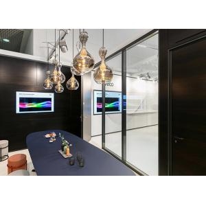 Modern demountable modular glazed wall system with venetian blind system windor