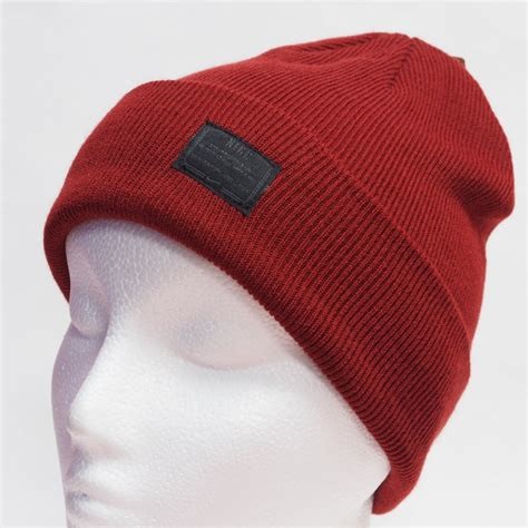 Buy Spandex Wool Crochet Knit Pom Pom Beanie With Embroidery Triangle Leather Logo at wholesale prices