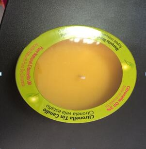 Buy Yellow Citronella tin scented candle with the printed label shrinked at wholesale prices