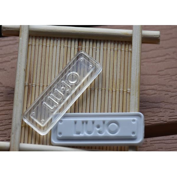 Degradable 2mm garment TPU Clothing Labels With Mould Embossed Logo