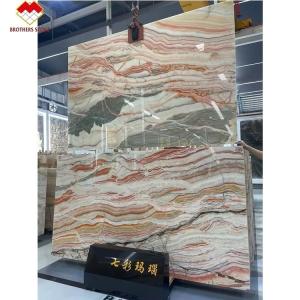 China Competitive Onyx Stone Veneer Book Match Colorful Onyx Flooring Tile Backlit Rainbow on sale