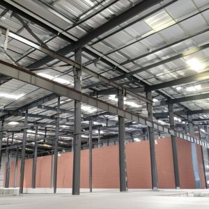 AWS D1.1 Welding Standard Steel Structure Warehouse Featuring 12m Brick Wall
