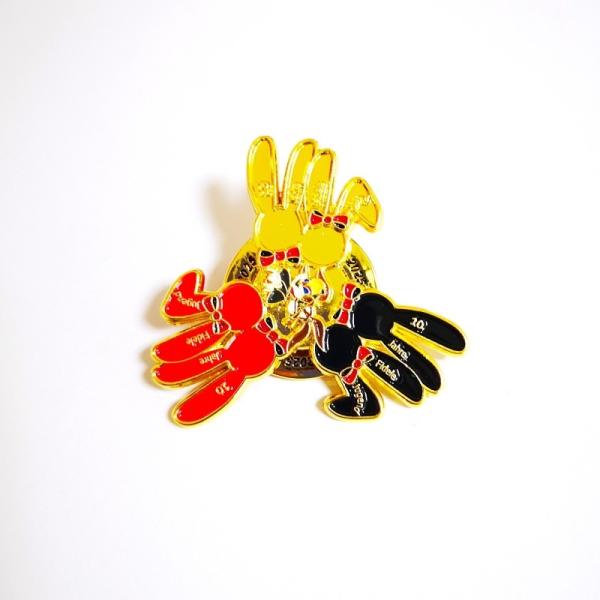 Buy Custom Metal Gold Spin Lapel Pin With Rubber Caps For Carnivals at wholesale prices