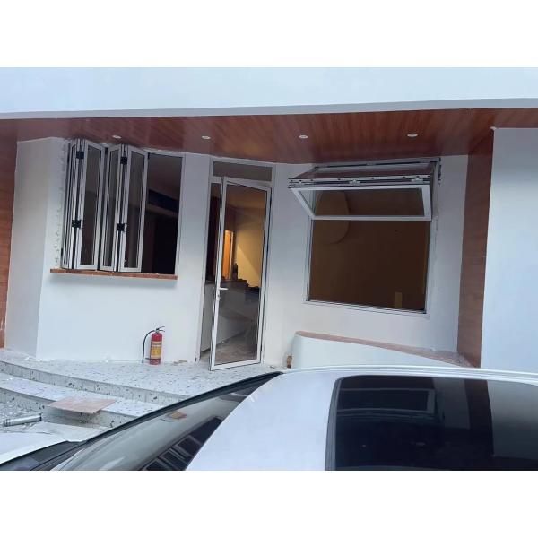 HearthGlow Fireplace Adjacent Folding Window Featuring Heat-Resistant Glass for Winter Evening Ambiance