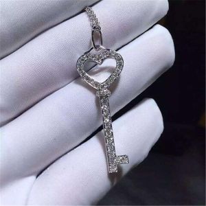 full diamonds of mini love key necklace 18kt gold with yellow gold or white gold