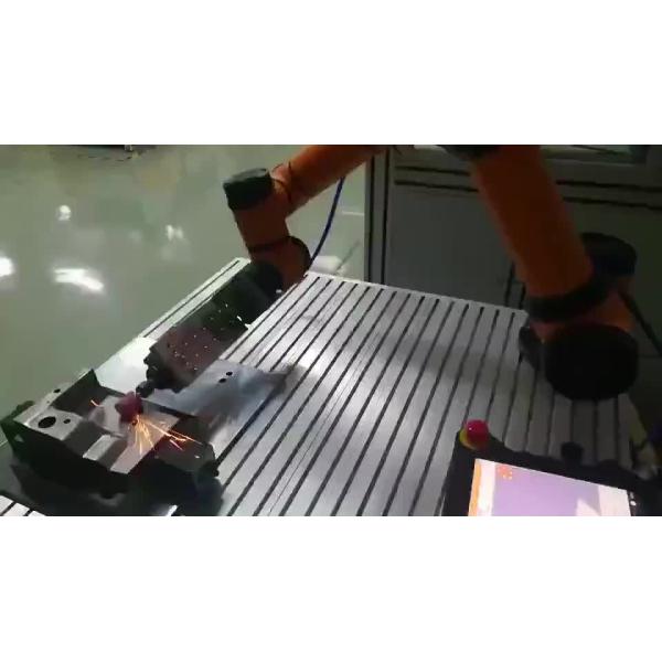 Robot arm 6 axis AUBO i5 pick and place robot operating with hand drive
