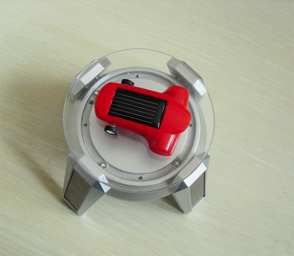 Rotary solar china display holder