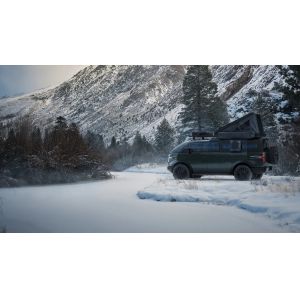 A purpose-built trcuk Canoo pickup w 8 ft bed with ample storage interior