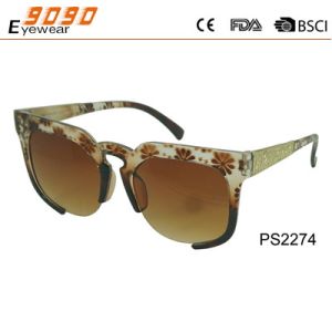 Sunglasses in fashionable design with brown color, made of plastic ,suitable for