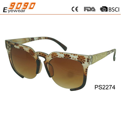 Sunglasses in fashionable design with brown color, made of plastic ,suitable for