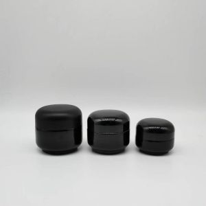 Quality 15ml 30ml 50ml Lady cream black jar serise empty cosmetic glass bottles for sale