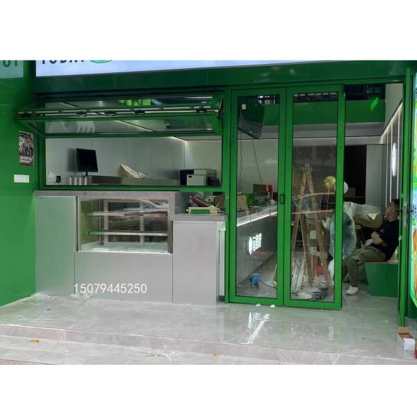 Slim-Profile Frameless Folding Window Illusion Creating Near-Invisible Transitions Between Interior and Deck Areas