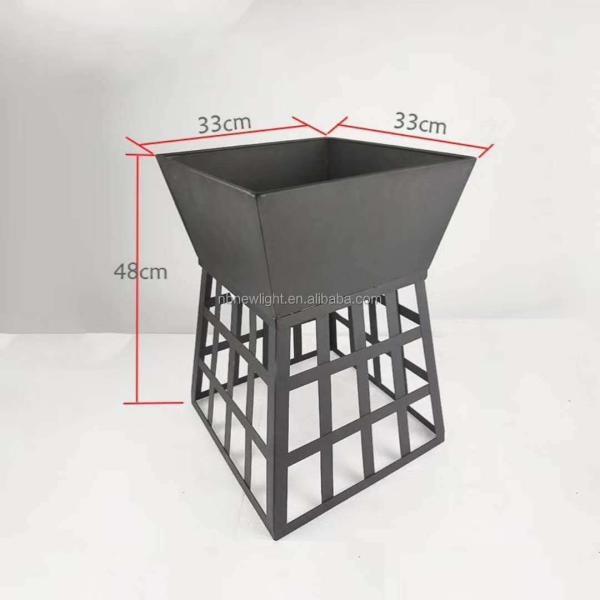 Modern Fire Pit Wood Furnace Fireplace for Bonfires and BBQs in Black Outdoor Setting