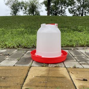 Effortless Hydration Red plastic chicken drinker Convenient Watering