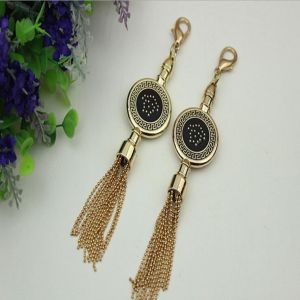 Quality Novelty DIY high-grade bag hardware accessories light gold drip glue hanging charm with tassel for sale