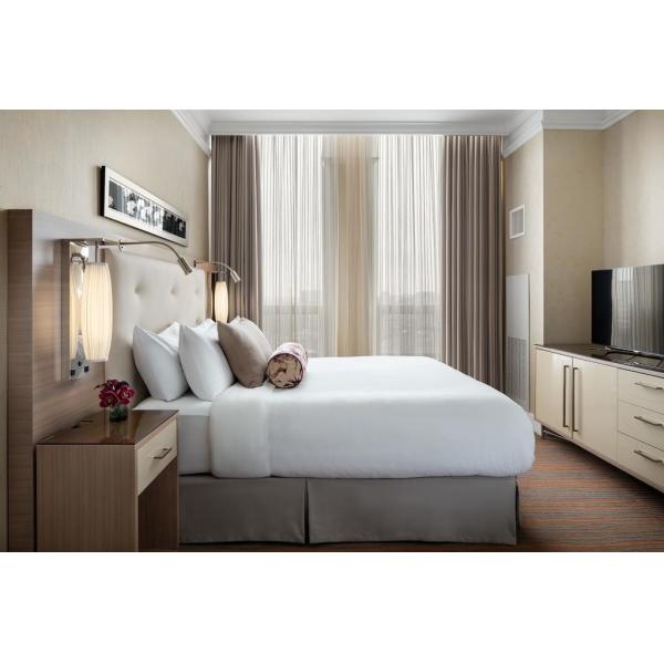 Buy laminated Oak wood Hotel bedroom Furniture sets Tall headboard with Fabric upholstered padded and TV units Contemporary at wholesale prices