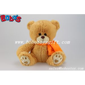 China Custom Plush Teddy Bear With Orange Scarf And Embroidery Paw on sale