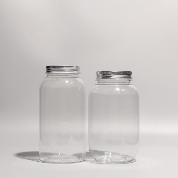 Buy Round Clear PET Bottle with Screw On Aluminum Lid at wholesale prices