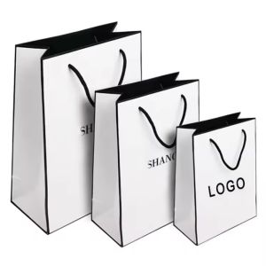 Quality Free Design Beautiful Custom Logo Printing Art Paper Bag Gift Clothing Shipping Bag With Handle for sale