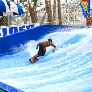 Enjoying Flowrider Water Ride , Surfing Attractive Wave Skid Board / Aqua Park