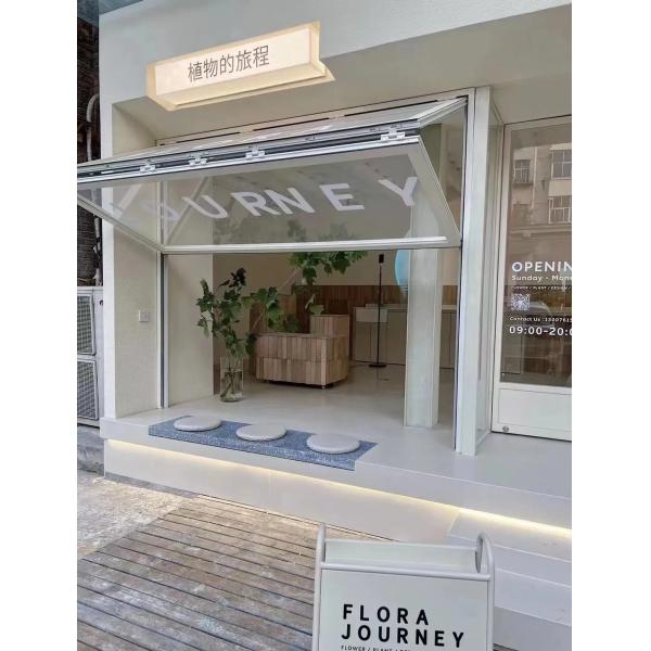 Hearth-Adjacent Folding Window Solution Providing Supplemental Ventilation During Wood Burning