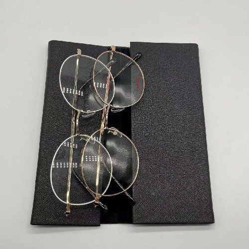 Buy Black Folding Triangular Metal Eyeglass Case Unisex Fasion Hard Nylon at wholesale prices