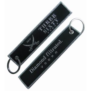 Quality Commemorative Custom Woven Keychain Full embroidery Shrink Proof for sale