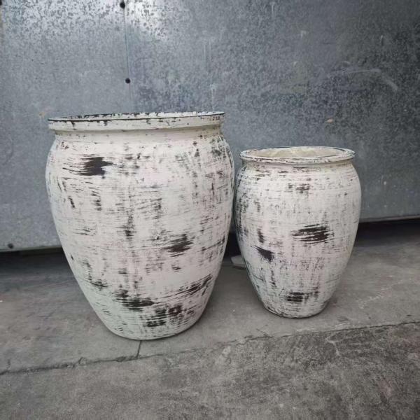 Irregular Black Brush White Round Fiber Clay Planter Lobby Redesign