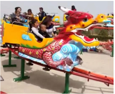 4 - 7km/H Speed Mini Roller Coaster 380v 8.8kw Rated Power 1.4m * 90cm Trolley Size