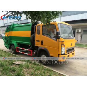 8cbm Sinotruk HOWO 4x2 RHD Trash Collection Truck