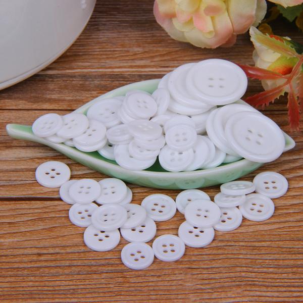 Custom Manfactur Low MOQ 14L Lettering White Ivory Resin Jeans Shirt Round Button For Clothes Resin Button 4 holes