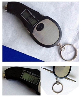 digital tire gauge with key ring & screwdrivers .