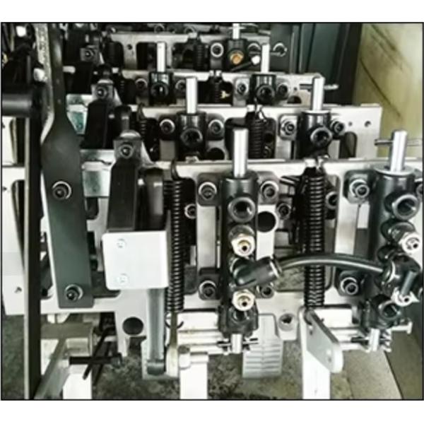 Close-up of XT-721 Tire Changer's mechanical components