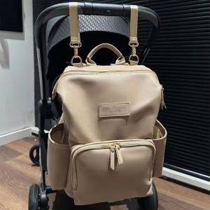 China Upgrade Your Mom Game with this Ultralight Waterproof Diaper Backpack Soft Handle and Cotton Lining Included on sale