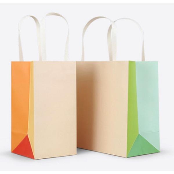 Buy new handmade wedding customized design gift paper bag with ribbon handle at wholesale prices