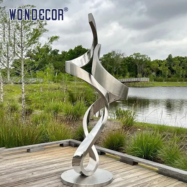 Buy Large forged metal shaped twisted geometric stainless steel sculpture in the park at wholesale prices