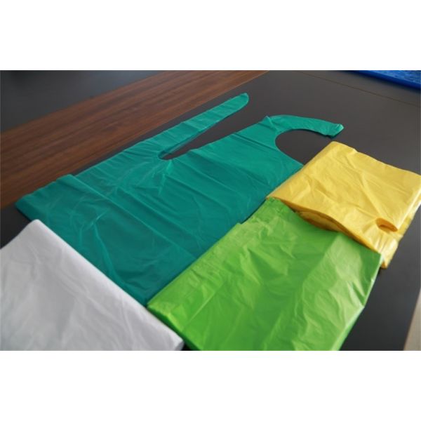 Buy Green / Blue / Yellow Disposable Plastic Aprons Embossed Surface Anti Bacterial at wholesale prices