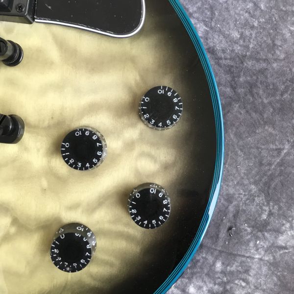 High quality new shape LP electric guitar custom guitar quilted maple wood with mahogany body neck rosewood fingerboard