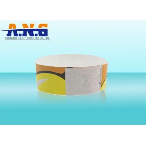 Integrated RFID or NFC chip RFID paper wristbands Non transferable , non - tear