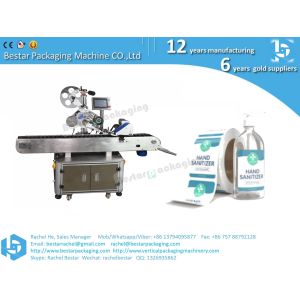 Double sides sticker on flat bottle automatic labeling machine