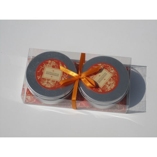 Buy 2pk Orange & Brown scented assorted tin candle with printed label,ribbon decor and packed into clear box at wholesale prices