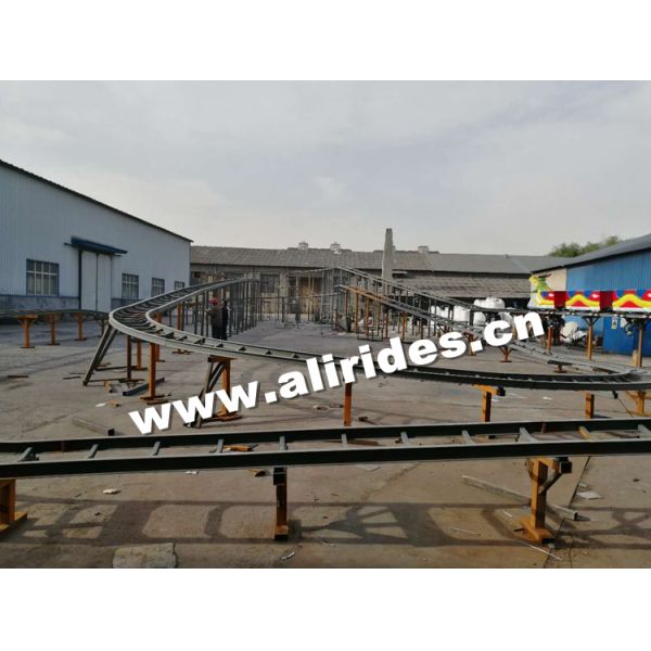 Fun park outdoor amusement equipment family game machine 12 seats space train roller coaster rides for sale