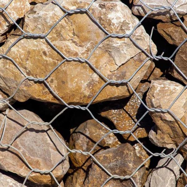 Versatile welded wire mesh gabion fence designed to provide support for retaining walls landscaping and perimeter security