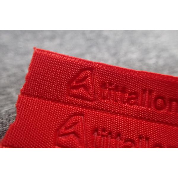Buy Red Embossed Sportswear Woven Band at wholesale prices