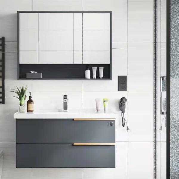 Modern bathroom vanity with marble countertop and chrome fixtures