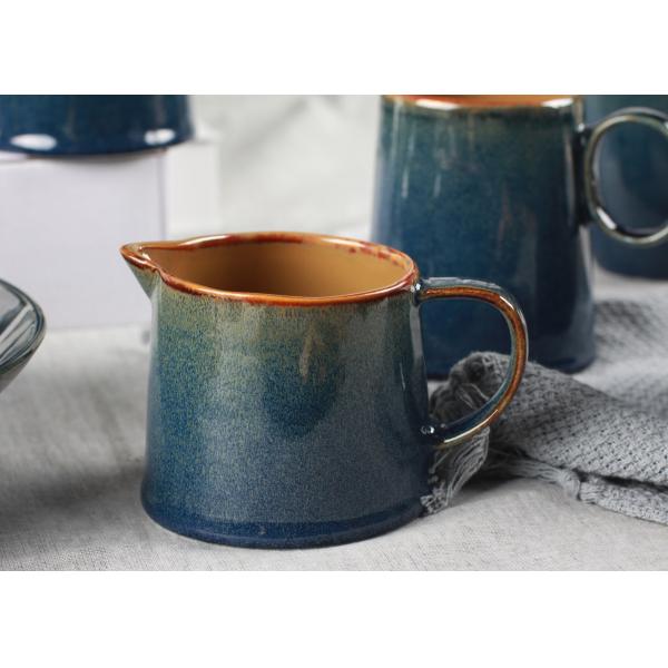 Lovely Little Ceramic Milk Pot Organic Shaped With Blue Reactive Color